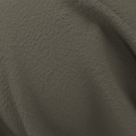 Close-up Shot of a Sheet of Stonewashed Linen in Moss Colour